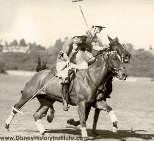 Walt Disney in action playing polo