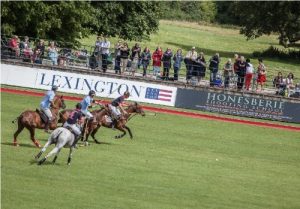 banner advertising superarena action shot with banners in background